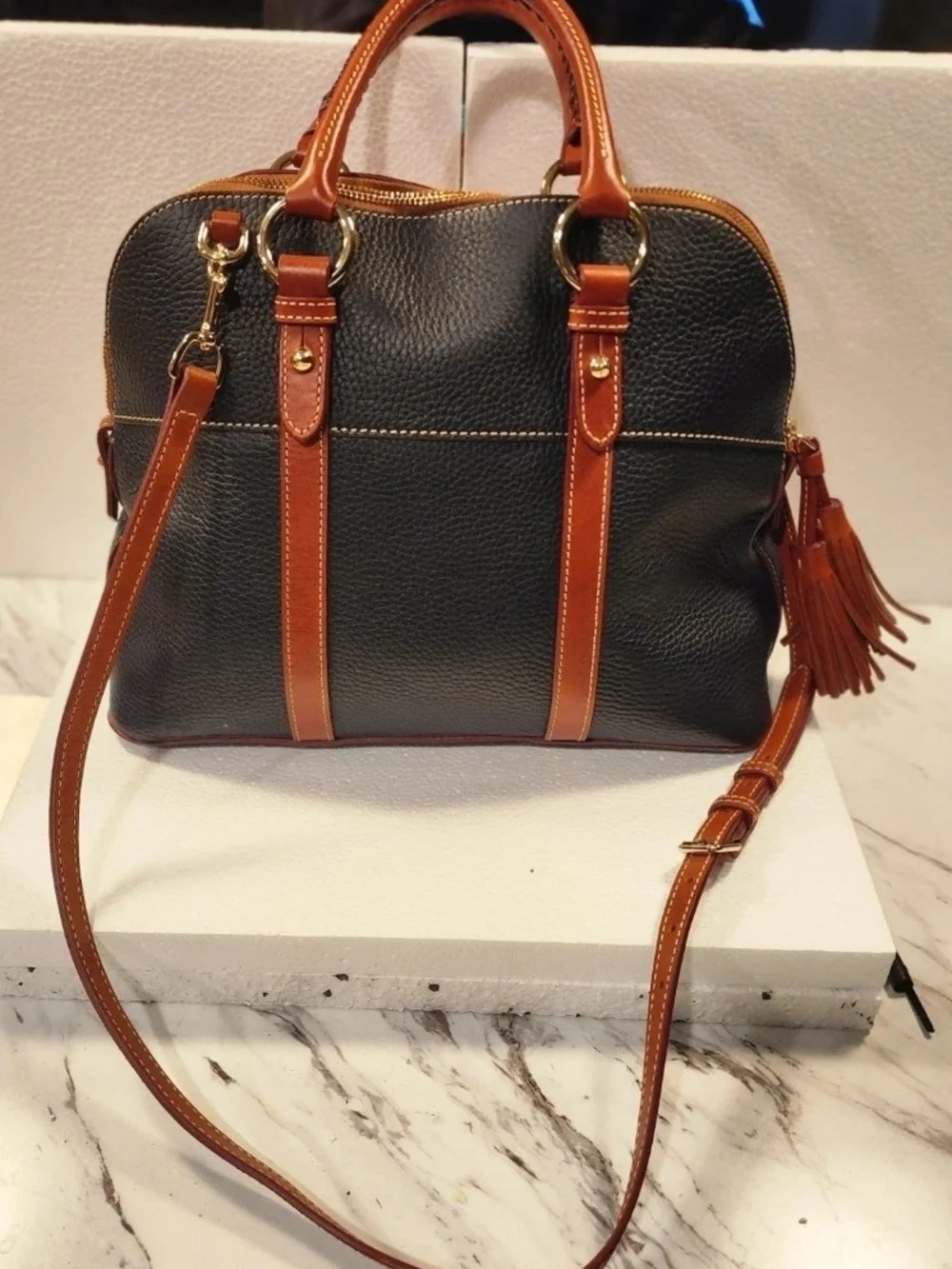 Dooney & Bourke Black Satchel with Brown Trim and Tassel